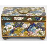 A late 19th/early 20th century Chinese cloisonné trinket box with carved jade-style floral tablet to