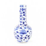 A 19th century Chinese vase of bottle form, with blue and white painted pattern depicting dragons,