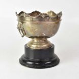 An Edwardian hallmarked silver twin-handled rose bowl with mask and scroll border, the handles in