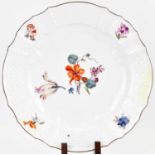 MEISSEN; a late 18th/early 19th century porcelain plate with hand painted garden flower spray to the