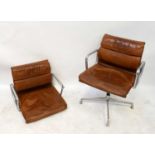 CHARLES AND RAY EAMES FOR HERMAN MILLER; a brown leather and cast aluminium swivel office chair,