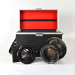 KODAK; a pair of Aero-Ektar f:2.5 7" 178mm 5x5 camera lenses, one with plate camera mount, housed in
