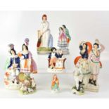 STAFFORDSHIRE; eight 19th century flatback figures to include dancing couples, cricketer, lovers, Mr