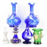 Various items of 19th and early 20th century glassware to include a pair of blue glass jugs with