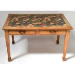 An early 20th century oak table with two frieze drawers, the top inset with panel of fruits and