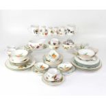 ROYAL WORCESTER; an 'Evesham' ware part dinner service comprising tureens, cruets, dishes, bowls,