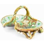 GEORGE JONES; a 19th century Majolica pottery strawberry dish with naturalistic decoration, with