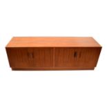 G-PLAN; a 'Fresco' teak double cupboard sideboard, 54 x 163 x 46cm.