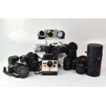 A collection of cameras to include a Pentax K10 with box, a Pentax MX, a Polaroid 1000 Land