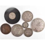 Seven United Kingdom silver and other coins, comprising an 1849 godless florin, a Queen Victoria