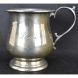 A George V hallmarked silver Christening cup, inscribed in retrospect, 'SMC July 7th 1933',
