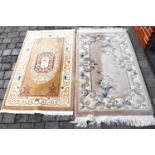 Two modern Chinese floral rugs, each 175 x 95cm (2).