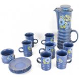 CARLTONWARE; a fifteen-piece 'Wellington' coffee service, floral pattern on blue ground,