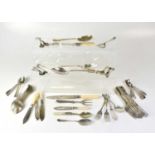 A quantity of silver plated ware to include flatware, cutlery, napkin rings, souvenir spoons,