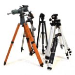 A group of six tripods with box of additional fittings, height of tallest 96cm (7).