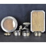 Various small items of hallmarked silver, to include four napkin rings, comprising a pair of oval