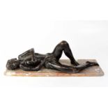 UNATTRIBUTED; a late 19th/early 20th century bronze reclining nude, on marble plinth, 9 x 56 x 14.