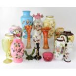A quantity of painted glass vases including two pairs, two further carnival glass flute vases, a