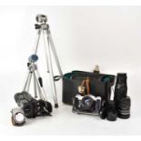 A collection of cameras and accessories to include a Zenit B 35mm film camera, a Canon UC-X1Hi