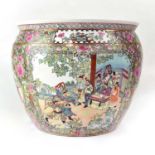 A 20th century Chinese Famille Rose jardinière/fish bowl with painted scene of figures in a garden