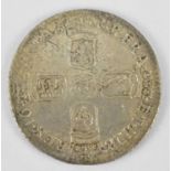 A William III 1696 silver sixpence.