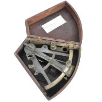 A late 19th/early 20th century sextant with lenses, with indistinct maker's mark, in wooden case,