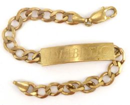 A 9ct gold identity bracelet with central panel between flat curb link and lobster claw clasp,