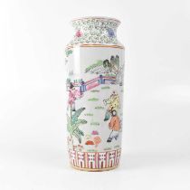 A Chinese Famille Rose vase of cylindrical tapered form, painted with children playing in a