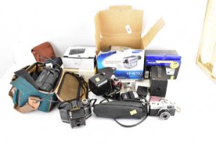 A large collection of modern and vintage cameras to include Praktica Model MTL 5, in leather case, a