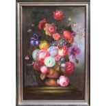 SCHOUTEN; a large oil on canvas, still life vase of garden flowers, in the Flemish style, signed