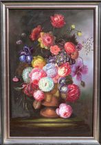 SCHOUTEN; a large oil on canvas, still life vase of garden flowers, in the Flemish style, signed