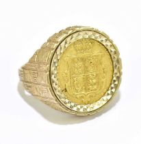 A Victorian half sovereign, shield back, 1859, set within a 9ct ring, size P, approx. 11.2g.