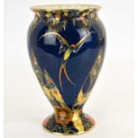 CARLTONWARE: a bulbous vase decorated in a 'Fantasy' lustre pattern, with colourful enamel and