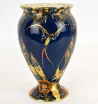 CARLTONWARE: a bulbous vase decorated in a 'Fantasy' lustre pattern, with colourful enamel and