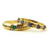 Two 9ct gold dress rings, one with tension set green stone, with two rows of white stones to the