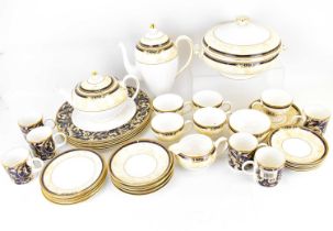 WEDGWOOD; a forty-piece 'Cornucopia' pattern tea and coffee set, comprising teapot, height 14cm,