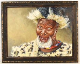 † JULIE G. ASKEW; acrylic on board, African tribal leader in full dress, head and shoulders,