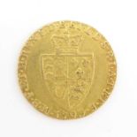 A George III guinea 1793, with shield back. Condition Report: - Approx. 8.37g. Diameter 2.47cm.