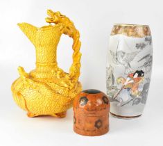 A yellow ground relief moulded jug with stylised dragon handle, height 40cm, a Japanese gilt-