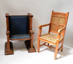 An ecclesiastical beech armchair with 'IHS' carved to the back, height 105cm, also an oak bishop's