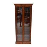 An early 20th century mahogany glazed bookcase, with five adjustable shelves, 206 x 89 x 33cm.