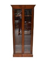 An early 20th century mahogany glazed bookcase, with five adjustable shelves, 206 x 89 x 33cm.