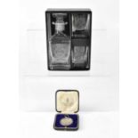 Naval shore base commemorative cased small decanter and a pair of shot glasses for HMS