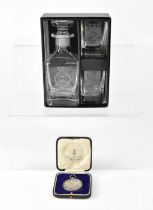 Naval shore base commemorative cased small decanter and a pair of shot glasses for HMS