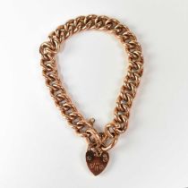 A 9ct rose gold bracelet with heart-shaped padlock clasp and safety chain, approx. 16g.