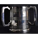 A large 19th century three-handled Elkington silver plated tyg, 'Awarded for fire discipline