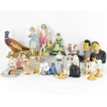 Twenty pottery, resin, antique and modern collectible figures, to include a 19th century