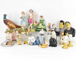 Twenty pottery, resin, antique and modern collectible figures, to include a 19th century