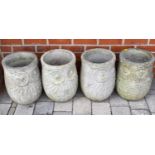 Four concrete owl planters of tapered cylindrical form, height of each 40cm, diameter of each