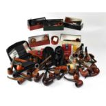 A large collection of pipes and accessories to include boxed and loose examples, a Glasdesign George